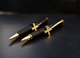 Cross ballpoint pens in black and gold finishes